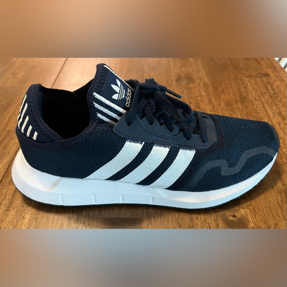Adidas Swift Run X in navy blue.